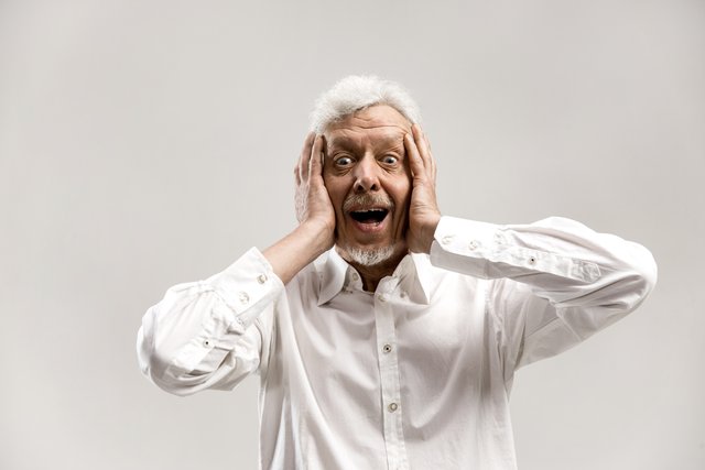 wow-senior-male-half-length-portrait-gray-studio-backgroud-mature-emotional-surprised-bearded-man-standing-with-open-mouth-human-emotions-facial-expression-concept.jpg