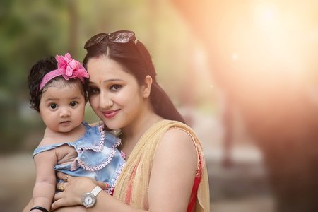 107365480-close-up-of-a-mother-loving-her-baby-girl.jpg