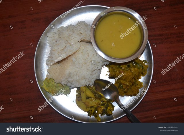 stock-photo-typical-nepali-traditional-meal-dal-bhat-tarkari-1840336984.jpg