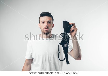 stock-photo-the-guy-is-holding-a-woman-s-bra-the-wife-found-her-husband-with-another-woman-bustaltern-594501659.jpg