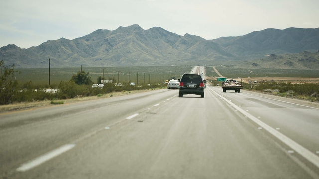 beautiful-open-road-cars-driving-on-desert-highway-from-las-vegas-nevada-to-los-angeles-california-1080p-hd_vkestxc4__F0000.png