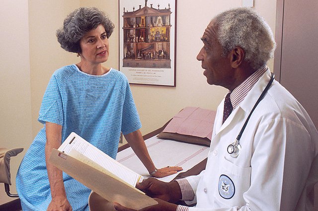 800px-Doctor_consults_with_patient_(7).jpg