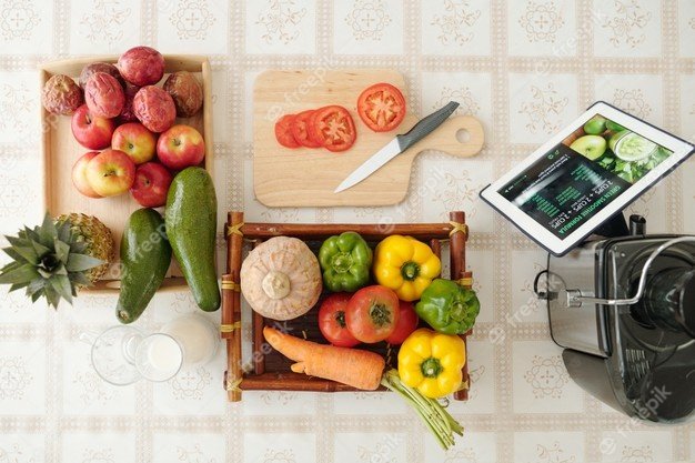 tray-with-fresh-vegetables-cutting-board-knife-tablet-computer-with-recipe-screen-viw-from-top_274689-23628.jpg