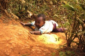 May-Stephanie-Rwanda-baby-on-ground-300x199.jpg