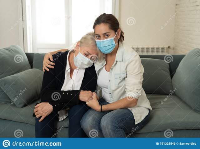 mother-daughter-crying-home-quarantine-grieving-loss-family-members-amid-covid-depressed-senior-wearing-medical-mask-191322546.jpg