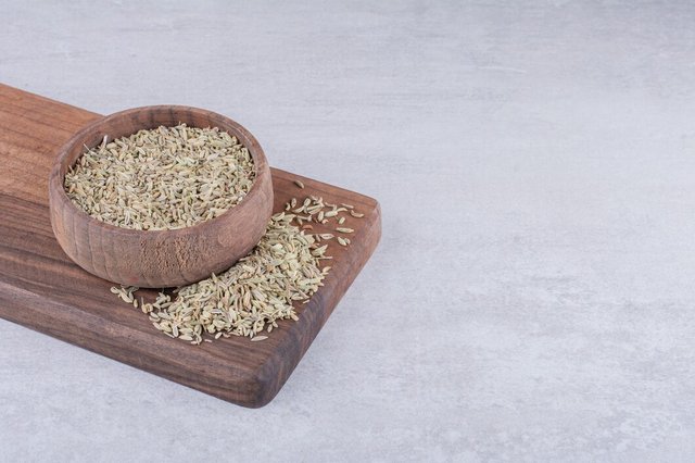 green-anise-seeds-wooden-board-concrete-surface_114579-71065 (2).jpg