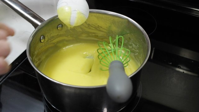 cooking the lemon curd.jpg