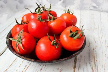 fresh-organic-red-tomatoes-black-plate-white-wooden-table-with-green-red-chili-peppers-green-peppers-black-peppercorns-salt-close-up-healthy-concept_114579-1204 (1).jpg