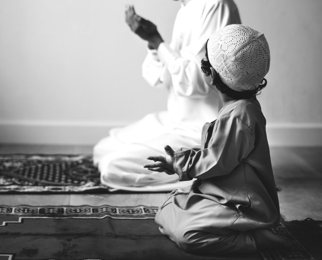 muslim-boy-learning-how-make-dua-allah_53876-25223.jpg