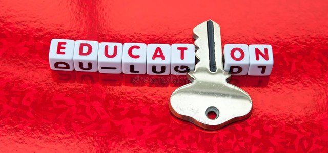 education-holds-key-text-inscribed-red-letters-small-white-cubes-letter-i-replaced-golden-red-background-52051426.jpg