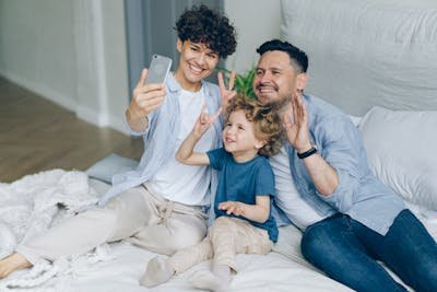 free-photo-of-man-woman-and-their-little-son-taking-a-selfie.jpeg