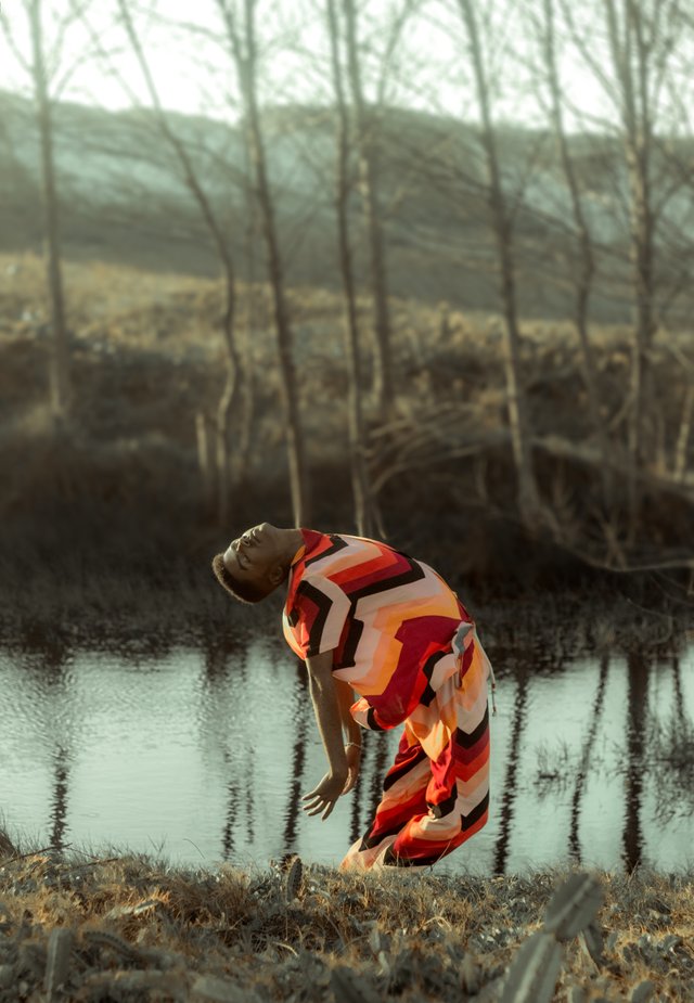 person-posing-near-body-of-water-3050912.jpg