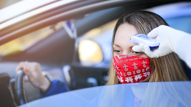 Coronavirus-Woman-Car-Drive-Through-Temperature-Check.jpg