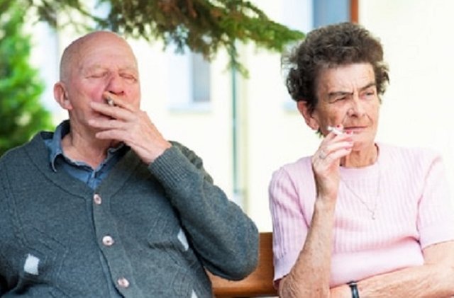 happy-old-couple-having-cigarette-260nw-155978678.jpg