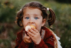 free-photo-of-portrait-of-girl-eating-apple (1).jpeg