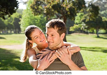 woman-hugging-her-handsome-husband-picture_csp5850247.jpg