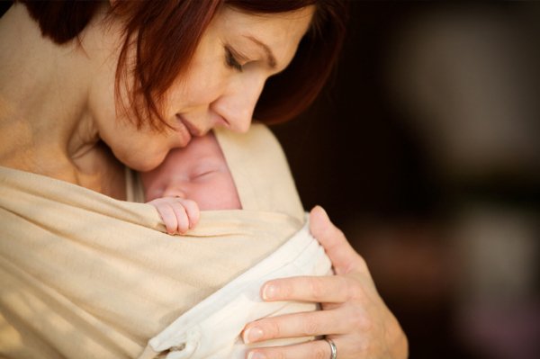 woman-holding-newborn_zy53gs.jpg