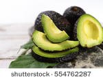 stock-photo-green-ripe-avocado-from-organic-avocado-plantation-healthy-food-554762287.jpg