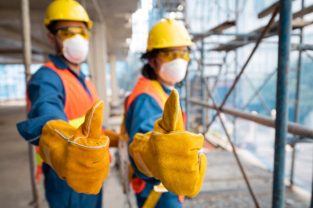 side-view-employee-with-safety-equipment.jpg