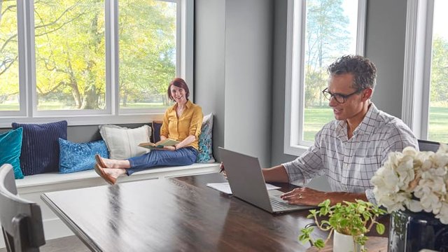 happy-couple-relaxing-in-living-room.jpg