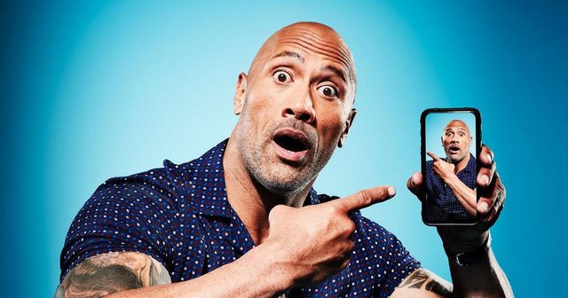 https _blogs-images.forbes.com_zackomalleygreenburg_files_2018_07_0703_The-Rock-phone_1200x630.jpg
