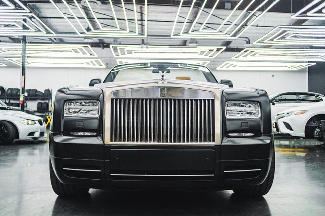 Canva - Black Rolls Royce Car.jpg