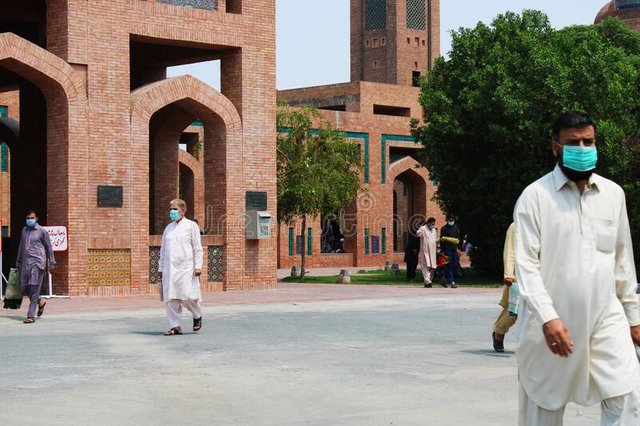 lahore-pakistan-june-unidentified-people-wearing-masks-praying-due-to-coronavirus-pandemic-grand-mosque-bahria-town-185860947.jpg