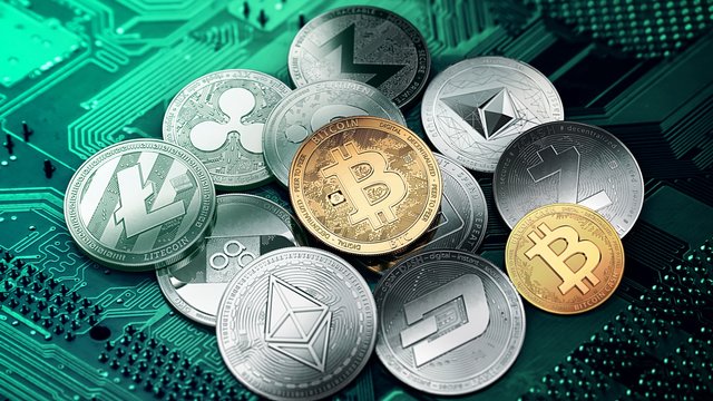 2019Finance_Wallpapers_Cryptocurrency_coins_are_on_the_computer_board_132933_23.jpg