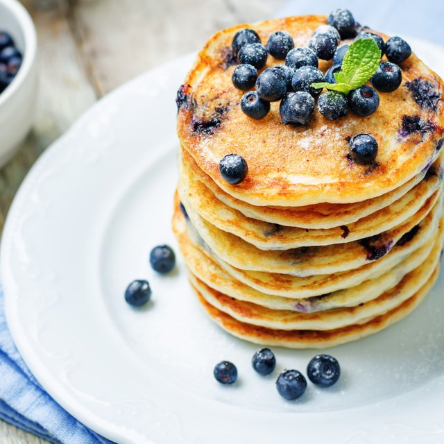blueberry-ricotta-pancakes-541279742-5ab2d59d04d1cf0036f81d80.jpg