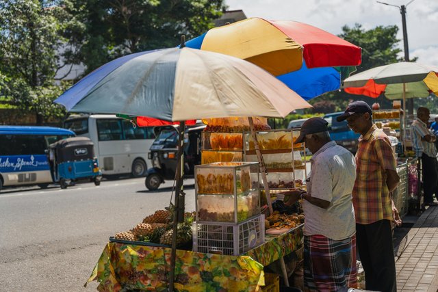 free-photo-of-outdoor-fruit-market-under-sunshades.jpeg