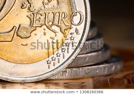 two-euro-coins-over-banknotescoins-450w-1308160366.jpg