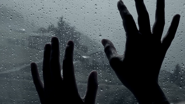 closeup-of-hands-in-front-of-rain-concept-of-sadness_n1rnaddhg__F0000.png