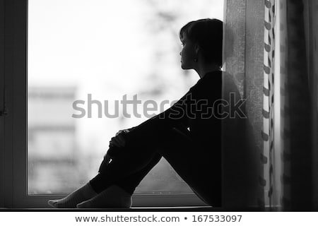 sad-girl-on-windowsill-looking-450w-167533097.jpg
