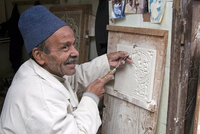 71038949-Craftsman-at-work-on-stucco-carving-the-Souk-Marrakech-Marrakesh-Morocco-North-Africa-Africa.jpg