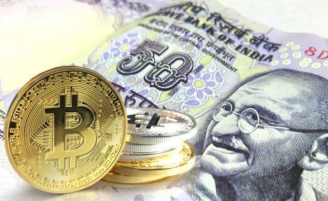 bigstock-Bitcoin-Coins-On-Indian-Rupee-228177433-640x394.jpg