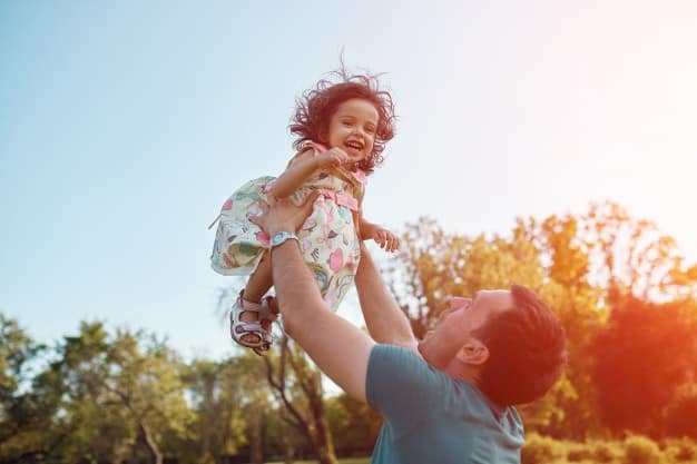 happy-father-daughter-laughing-together-outdoors.jpg