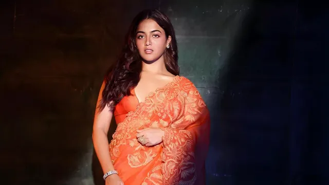 wamiqa-gabbi-stuns-in-orange-floral-saree-and-plunging-blouse.webp