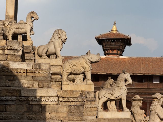 bhaktapur-kathmandu-nepal-h-stairs-of-the-siddhi-lakshmi-temple-flanked-by-camels-man-lions-rhinos-and-horses.jpg