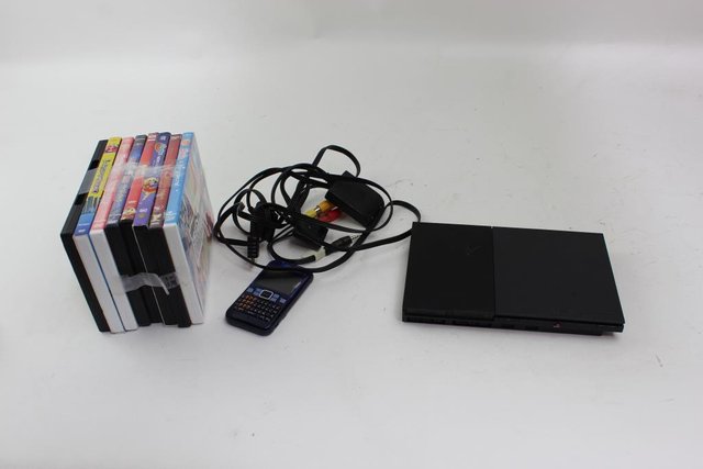 sony-ps2-game-console-assorted-dvd-movies-and-more-10-pieces-1_16820181937433892049.jpg