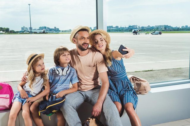 stock-photo-happy-family-taking-selfie-in.jpg