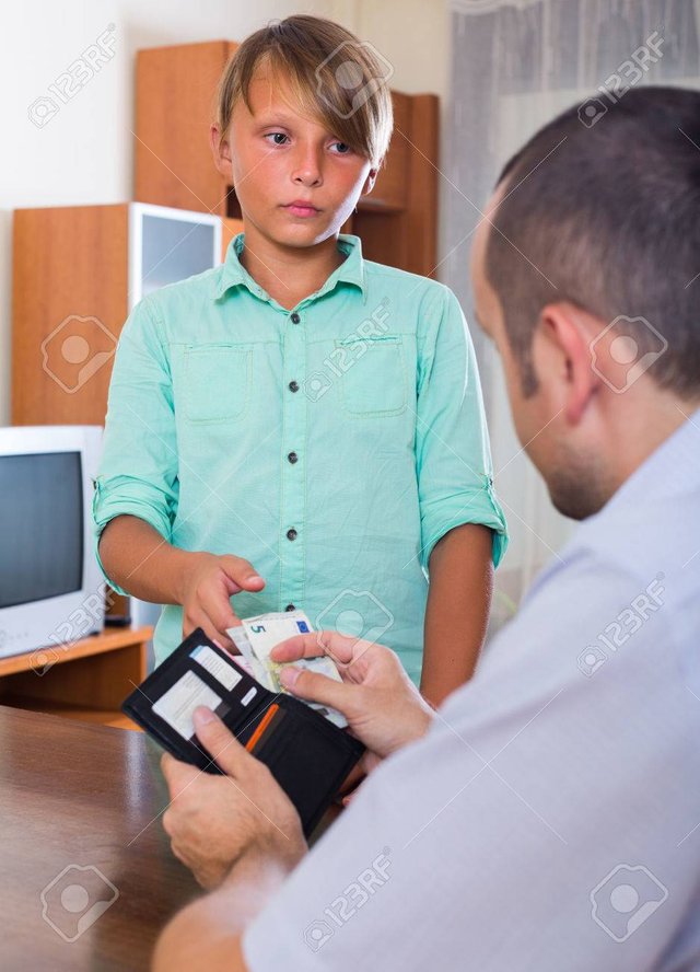 50799805-teenager-boy-asking-dad-for-small-pocket-money-at-home.jpg