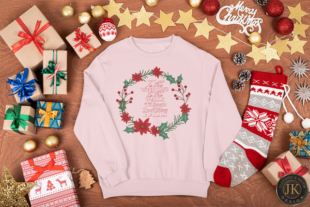 mockup-of-a-crewneck-sweatshirt-surrounded-by-christmas-presents-m31.png