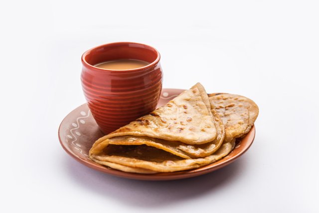 chai-paratha-hot-tea-served-with-flatbread-is-a-traditional-simple-meal-from-india-and-pakistan-free-photo.jpg