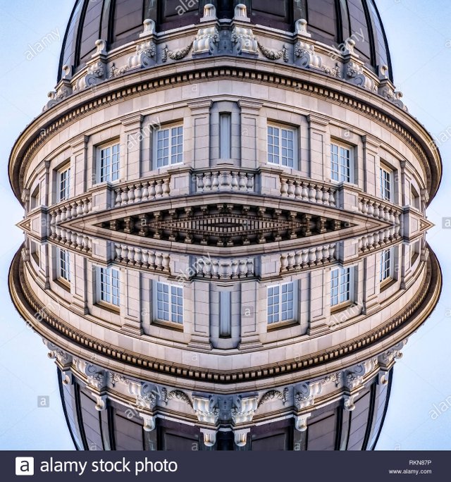 reflection-of-utah-state-capital-building-vertical-geometric-kaleidoscope-pattern-on-mirrored-axis-of-symmetry-reflection-colorful-shapes-as-a-wallp-RKN87P.jpg