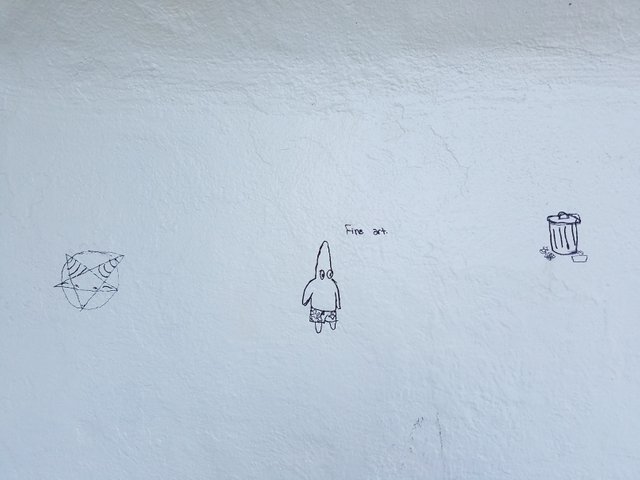 Doodles on a white wall
