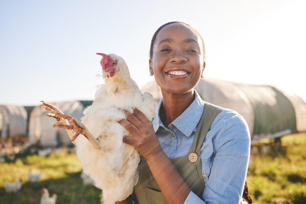 african-farmer-woman-chicken-portrait-outdoor-field-healthy-animal-sustainable-care-livestock-agro-job-poultry-entrepreneur-smile-bird-nature-countryside-agriculture_590464-216708.jpg