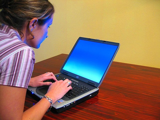 Woman-typing-on-laptop.jpg