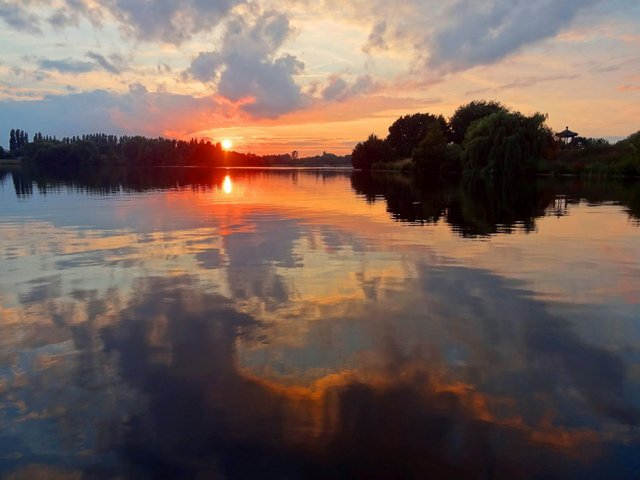 sunset-lake-water-reflection-clouds-45160.jpeg