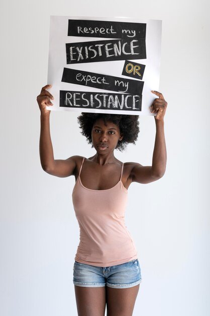 close-up-woman-expressing-revolution-message_23-2149066812.jpg