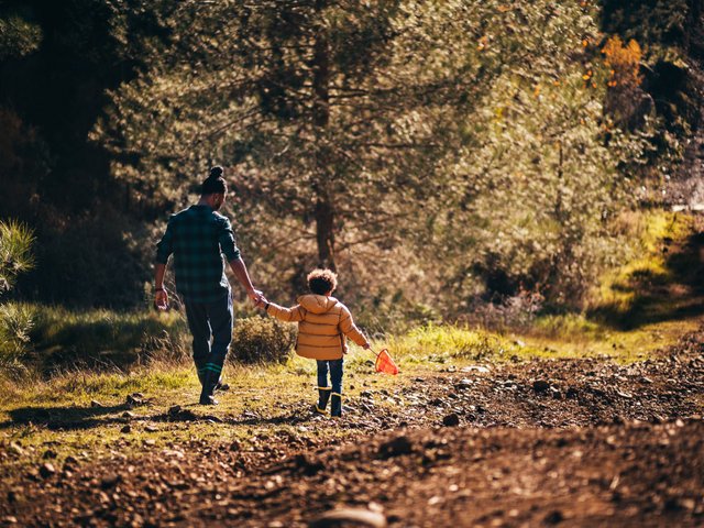 father-and-son-with-rain-boots-and-net-going-fishing-925289122-5c4da76bc9e77c0001380374.jpg